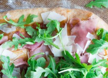 Prosciutto, Parmesan, and Arugula Flatbread with Fig Jam Spread by My Utensil Crock